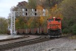 C-NRMOPP winds through the curves as the rear passes under the signal bridge